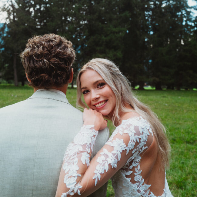 bride and groom embracing in alpine landscape in Bavaria