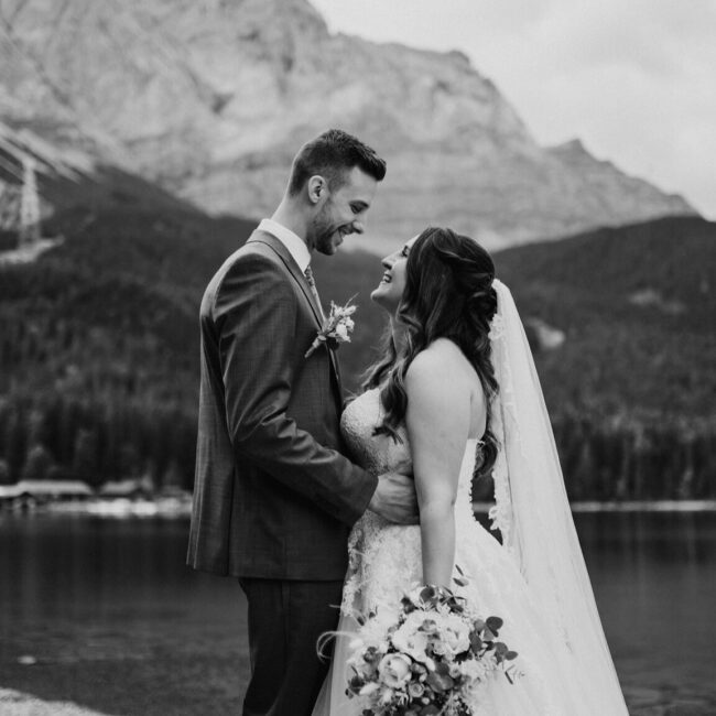 Elegant alpine mountain wedding couple at Eibsee, zugspitze