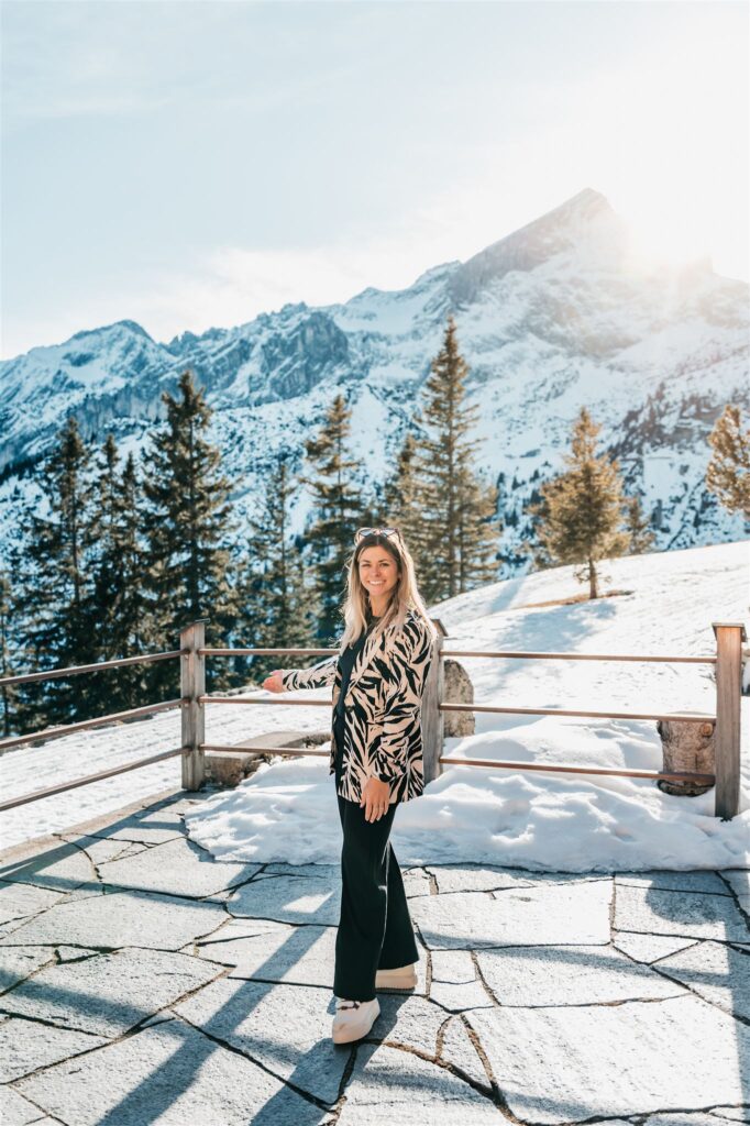 Wedding planner Angelika from AWIKA Weddings at an Alpine wedding location with mountain view