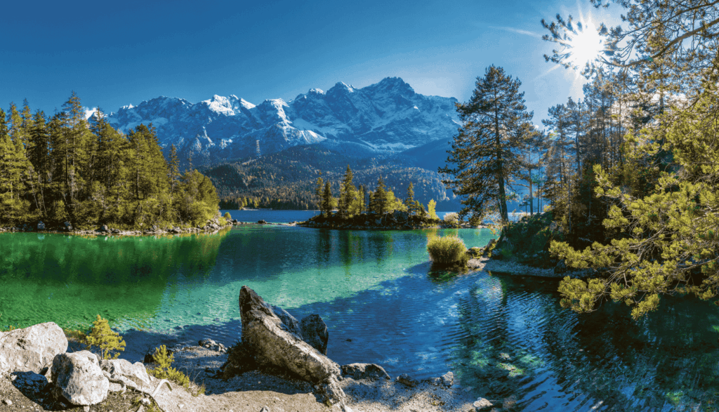 Crystal clear alpine lake with mountain view near Schloss Elmau in the Bavarian Alps
