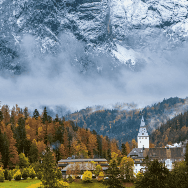 Wedding ceremony setting at Schloss Elmau with mountain view in the Bavarian Alps
