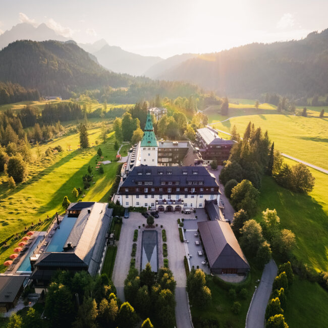 Schloss Elmau luxury resort in the Bavarian Alps surrounded by mountains and open landscapes