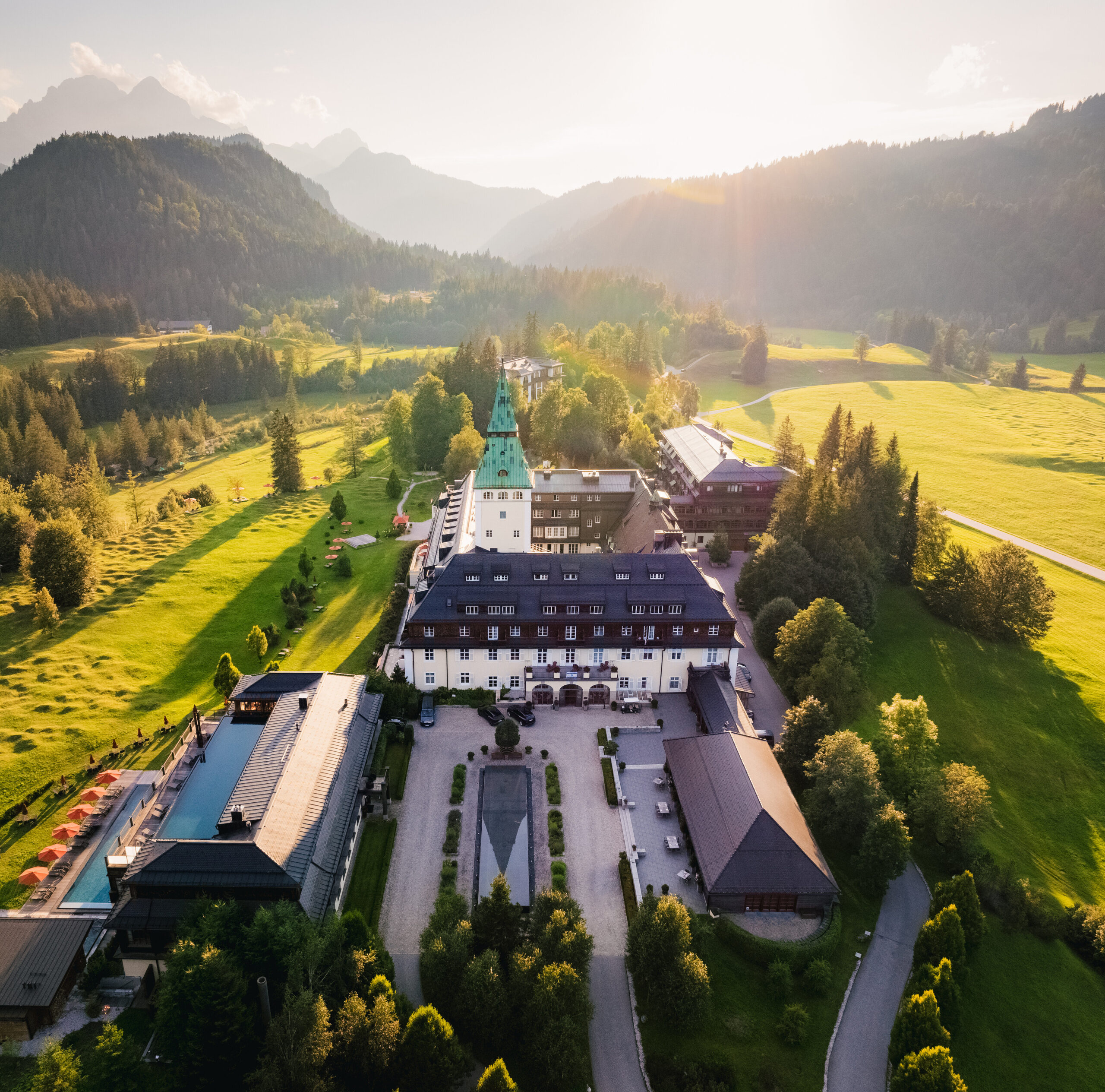 Schloss Elmau luxury resort in the Bavarian Alps surrounded by mountains and open landscapes