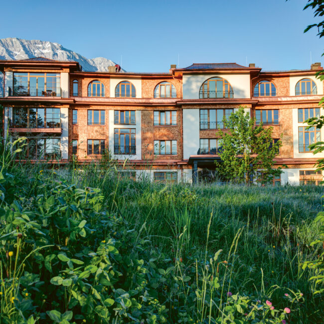 Schloss Elmau Retreat building surrounded by alpine nature in the Bavarian Alps